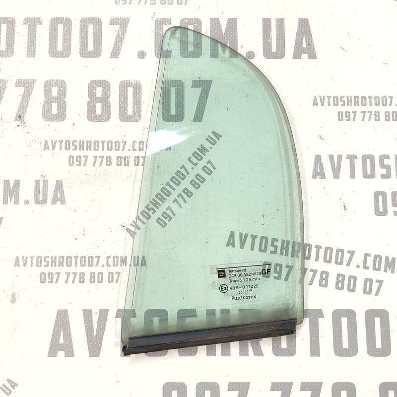 Скло дверей заднє ліве Opel Astra G (97-04) 2.0D