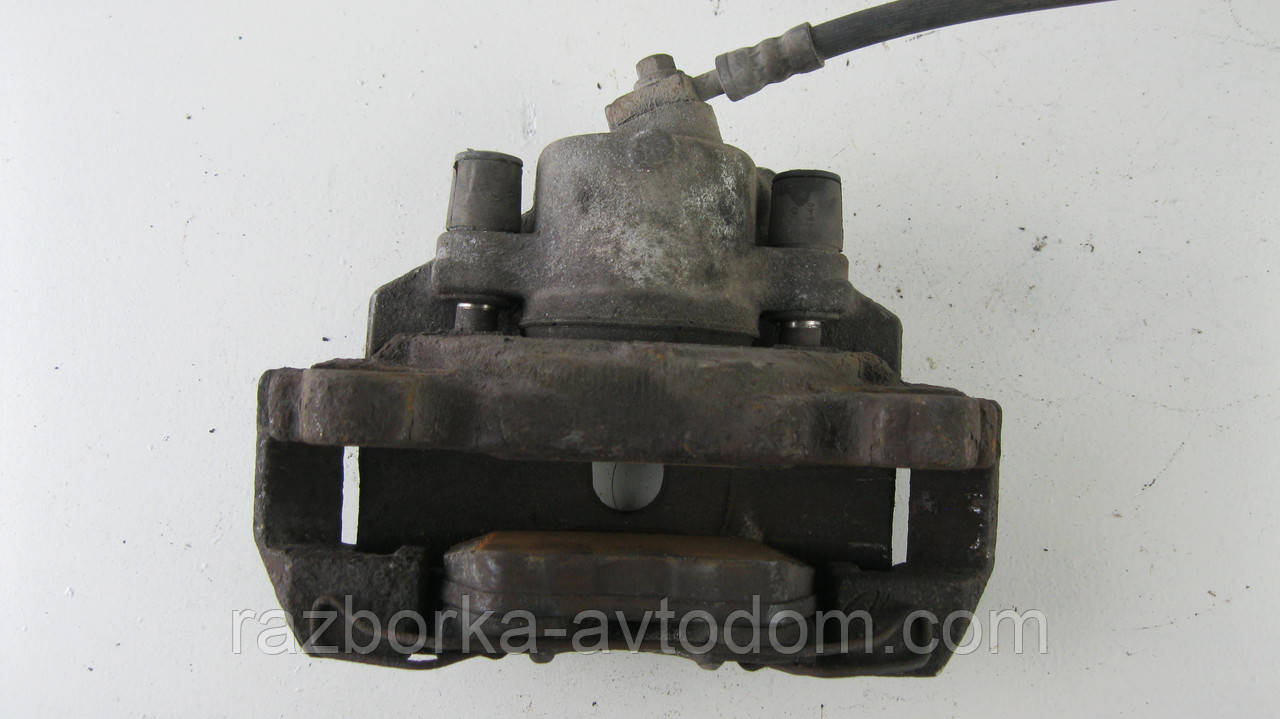 Суппорт передній правий VW Touran (03-10) (ATE), CAddy (04-15) OE:1K0615124E