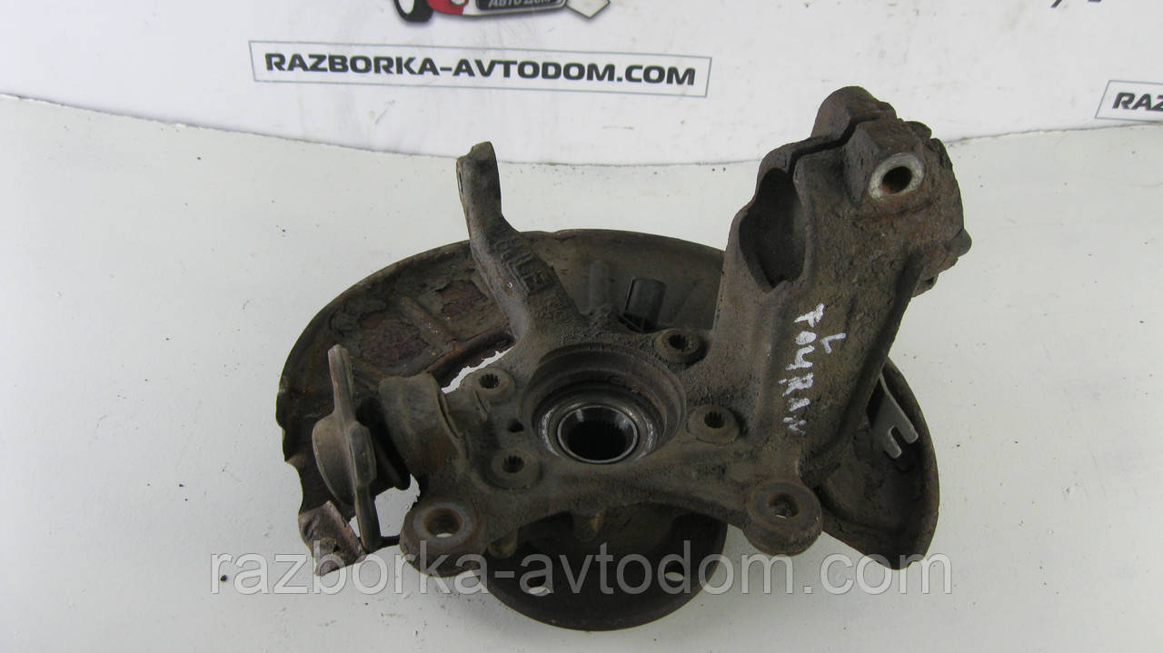 Поворотний кулак лівий (цапфа) з ABS (кріплення маточини 4 болти) VW Touran (03-10) OE:1K0407255AA