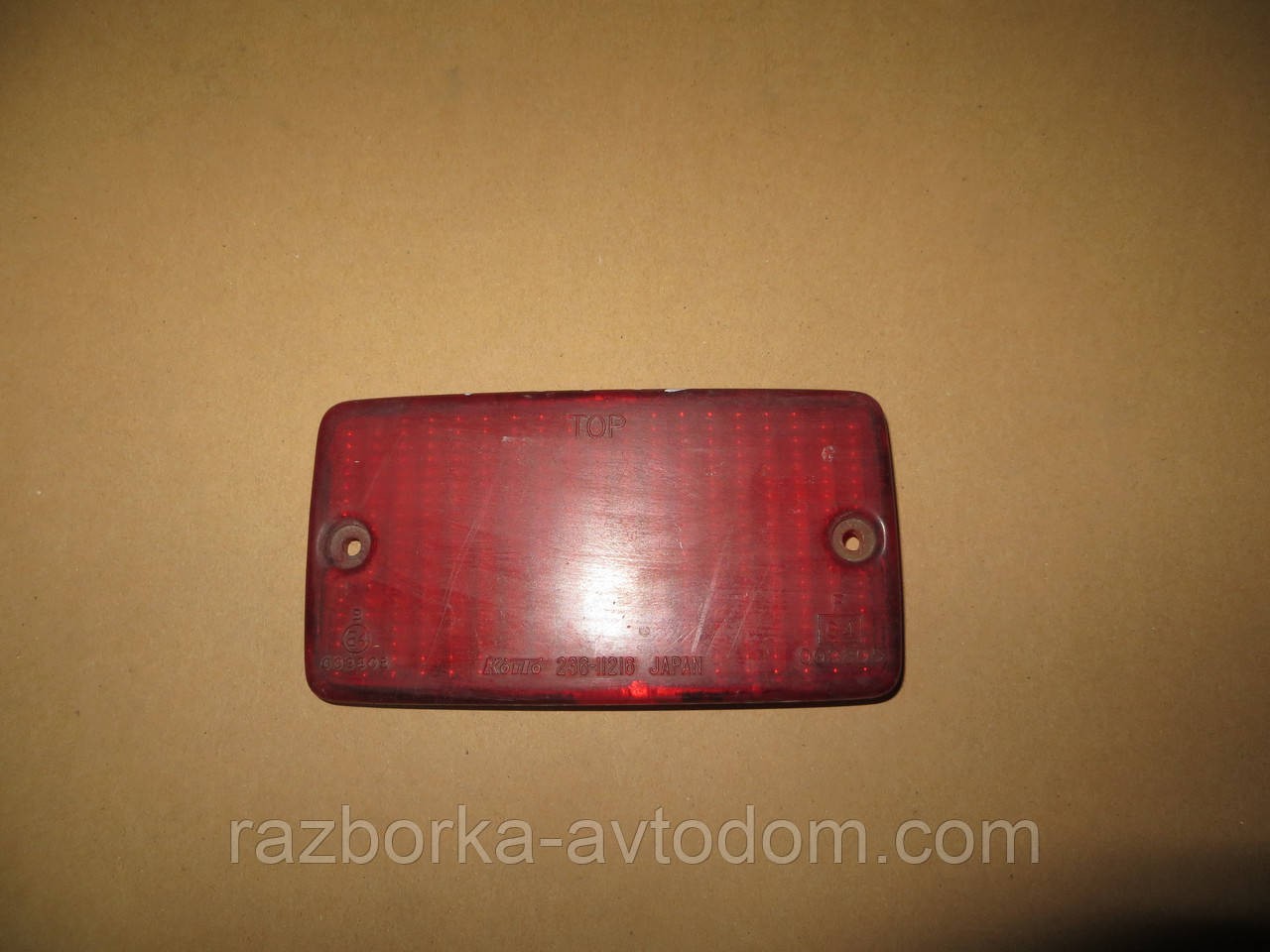 Скло фари задньої протитуманної Daihatsu Sporterak (89-92) OE:koito 236-11216