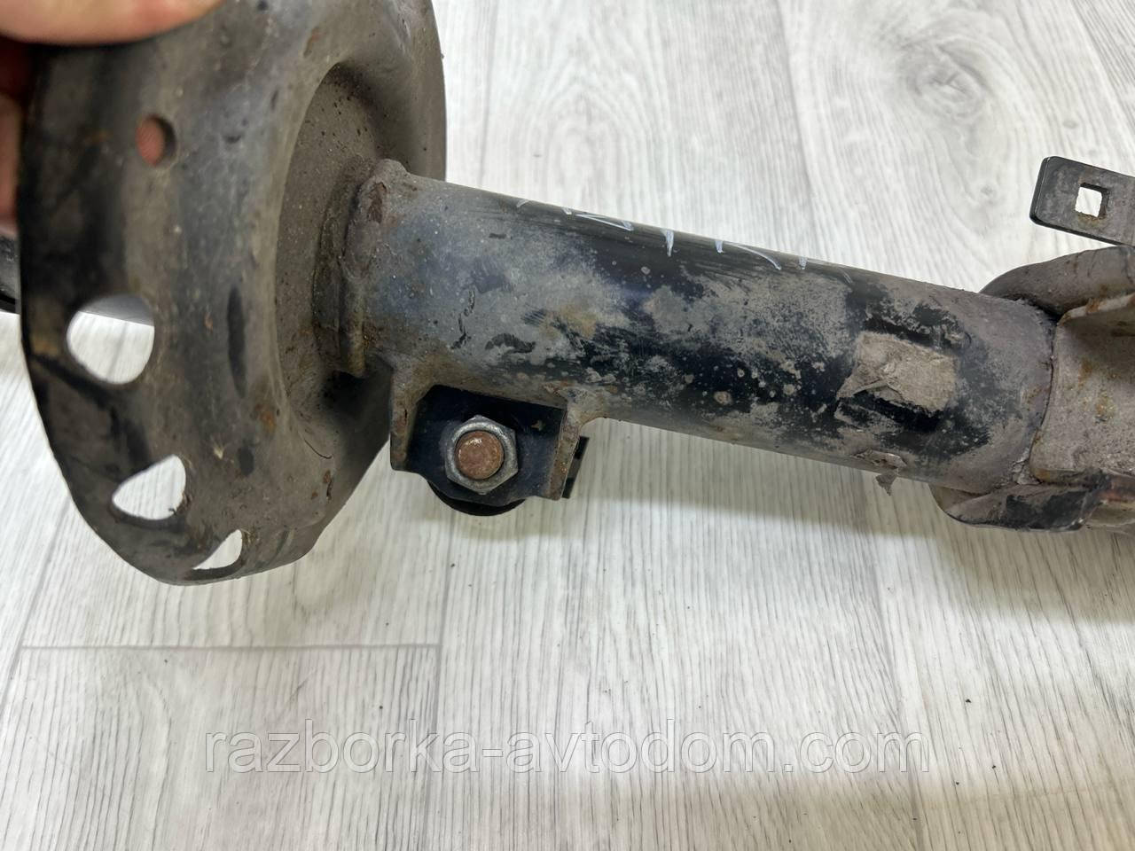 Амортизатор передній правий Opel Astra H, Zafira B OE:93179693