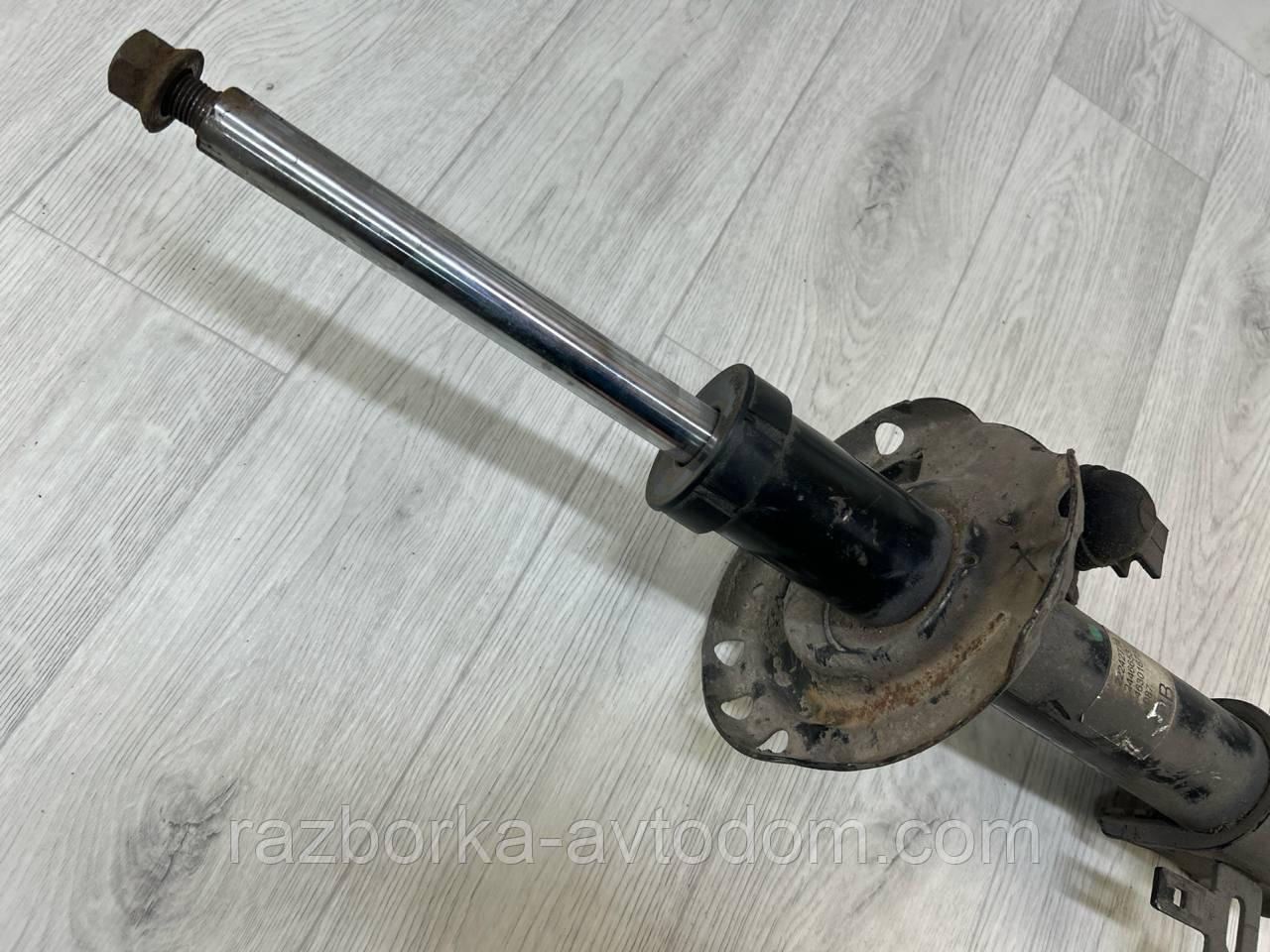 Амортизатор передній правий Opel Astra H, Zafira B OE:93179693
