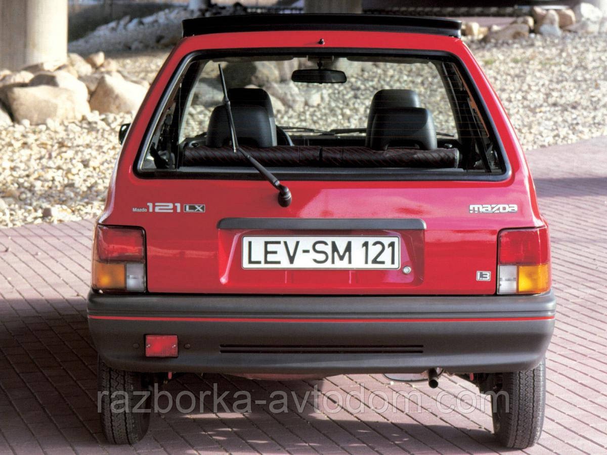 Бампер задній хетчбек Mazda 121 DA (88-91)