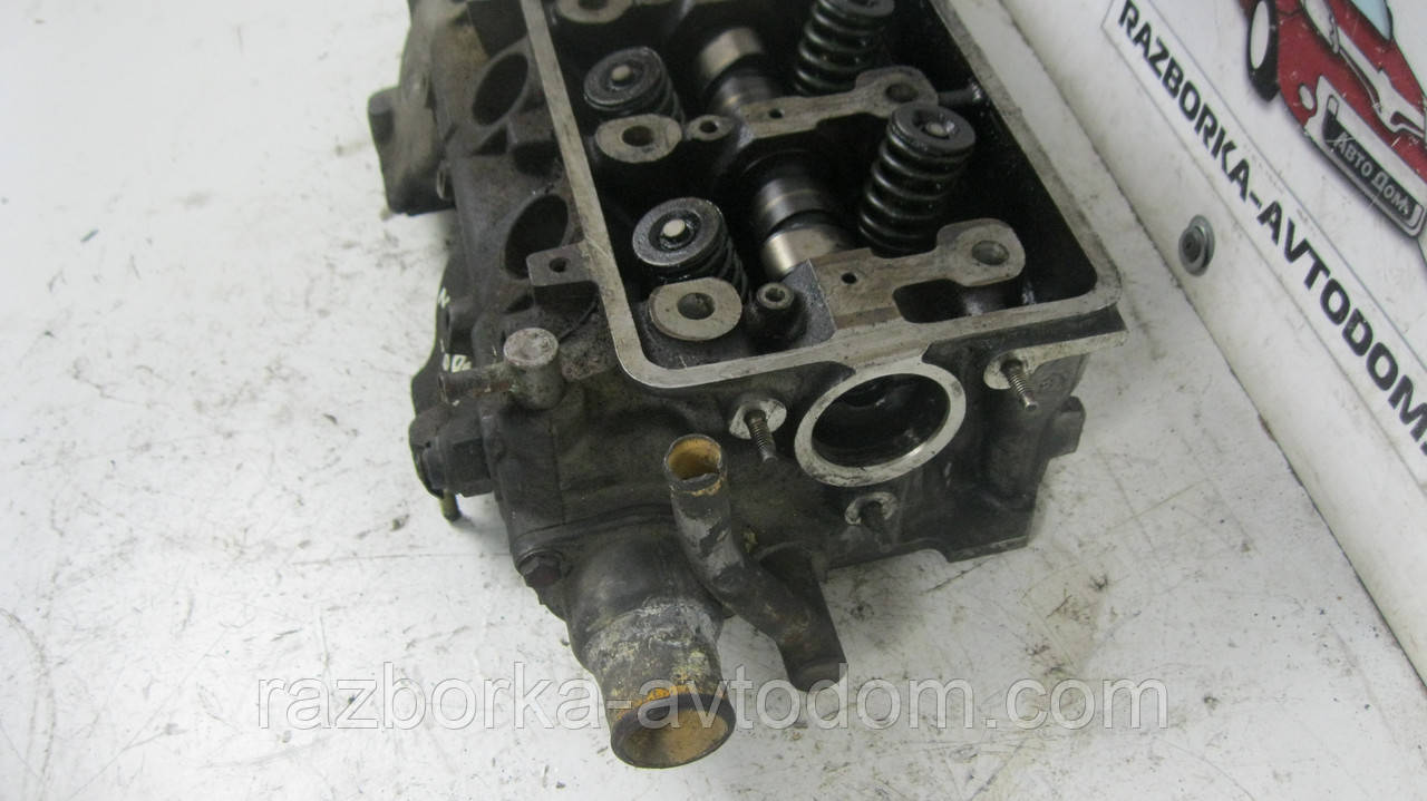 Головка блока циліндрів (ГБЦ) Peugeot 205 1.6 CTI (1986-1992) OE:9753069010