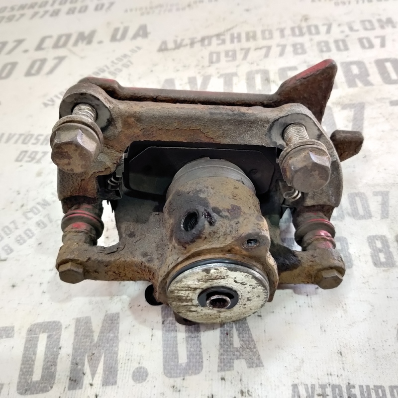 Тормозний супорт Audi A4 B8 (07-15) 2.0D задній правий