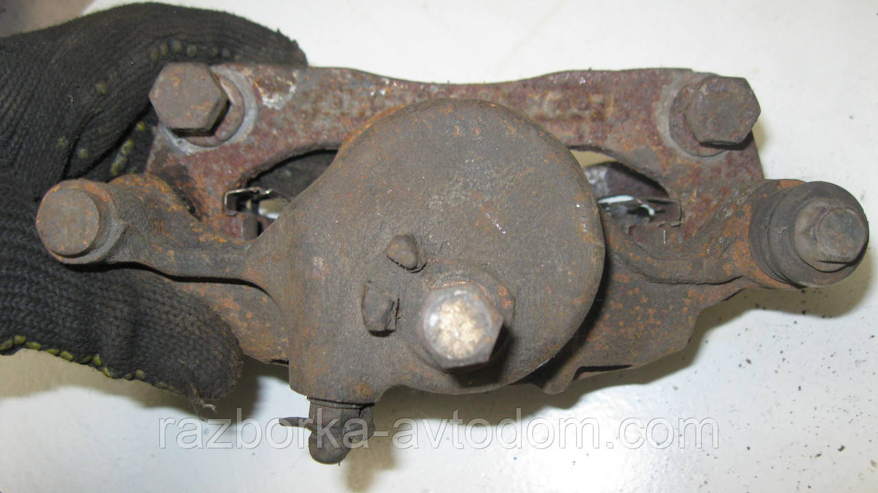 Суппорт передній правий Hyundai Excel, Pony, Accent 2, Mitsubishi Precis OE:5818124A00