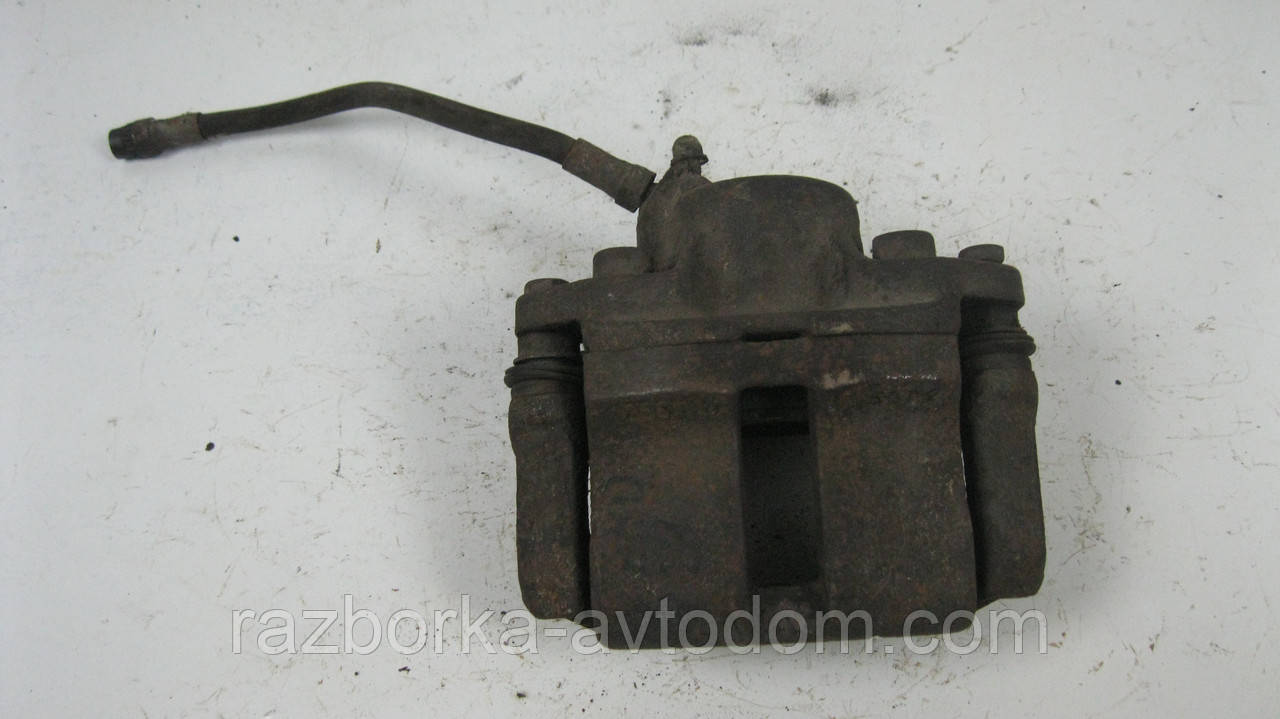 Суппорт передній правий Renault 21 (1986-1988) OE: 7701499302
