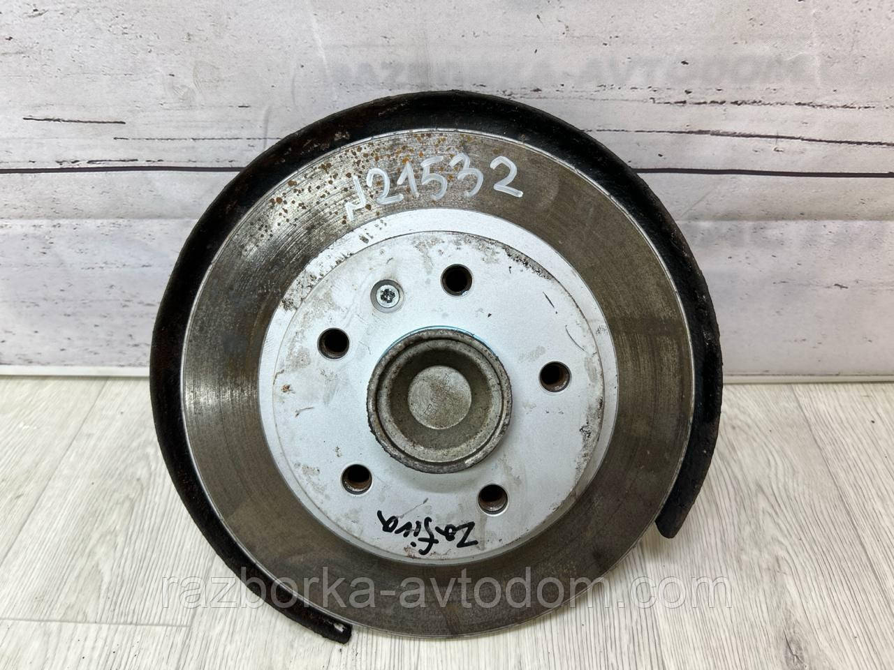Ступиця задня ліва з гальмівним диском (під ABS) Opel Zafira A OE:9119931