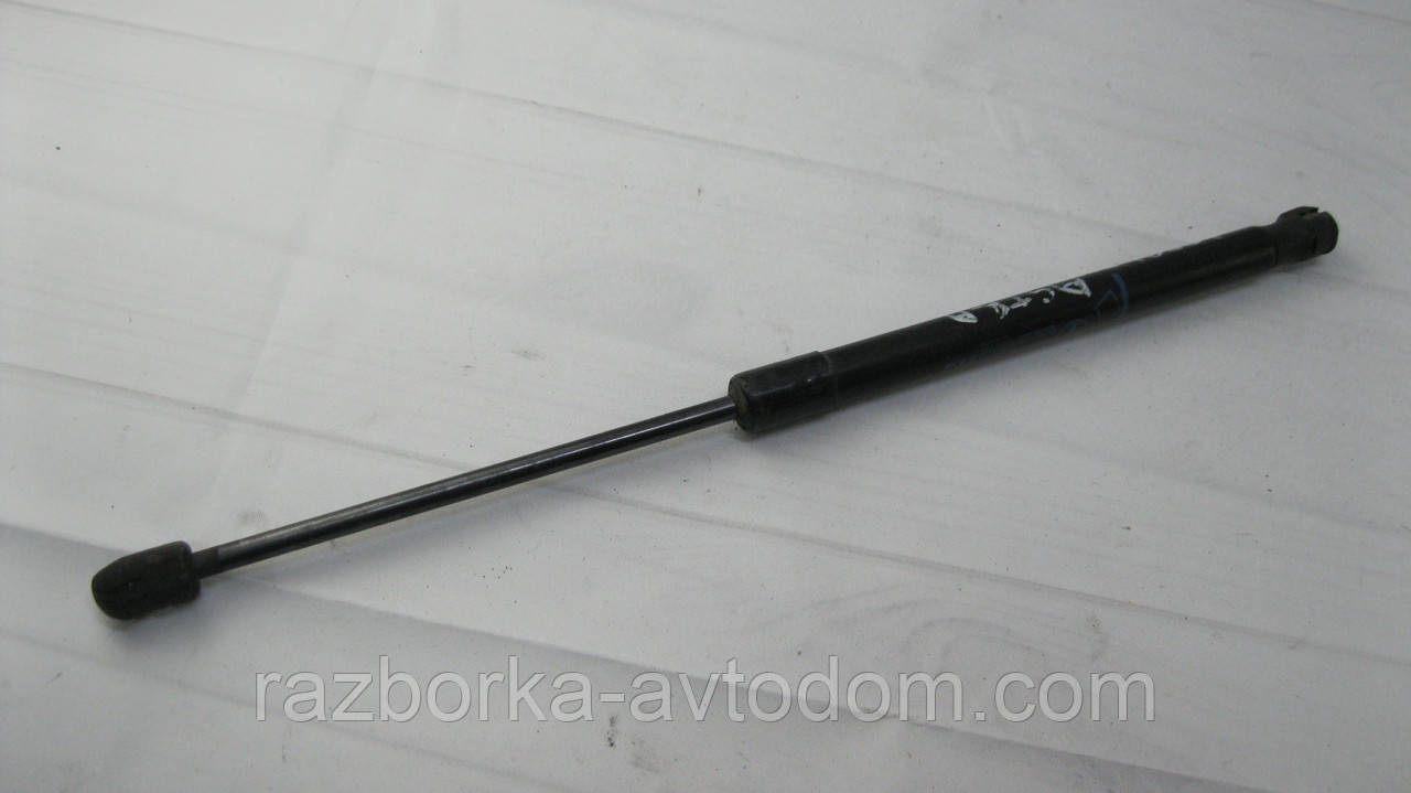 Амортизатор багажника Opel Astra H (2005-2015) OE:24463829