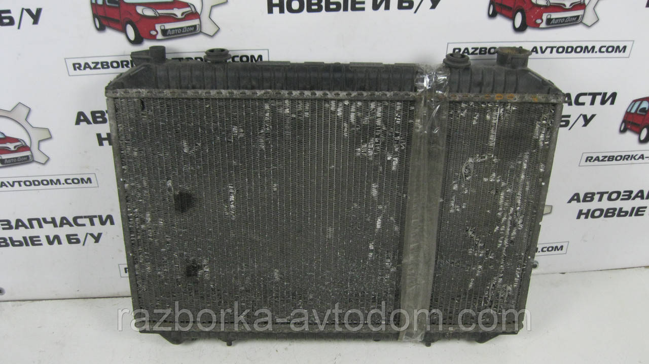 Радіатор охолодження двигуна Nissan Vanette C23 (1991-2001) 2,3D, 1,6i OE:214107C002