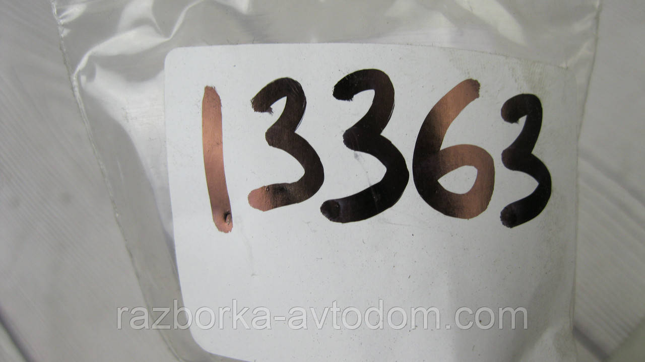 Кріплення тримач сонцезахисного козирка правий/лівий Opel Combo (01-12) Corsa C, Meriva OE:09116587