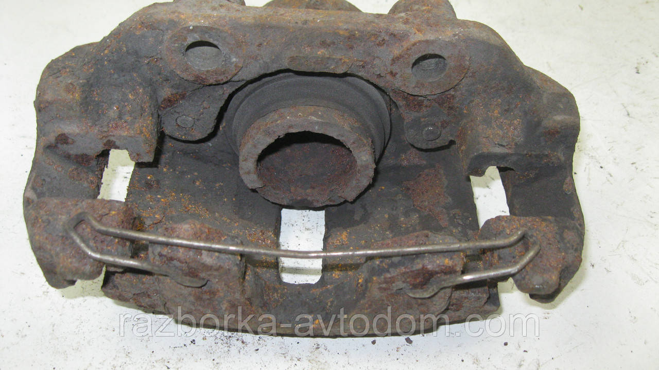 Суппорт передній лівий Opel Kadett E, Astra F, Vectra B, Vectra A, Calibra A, Daewoo Lanos Nexia OE:93173143