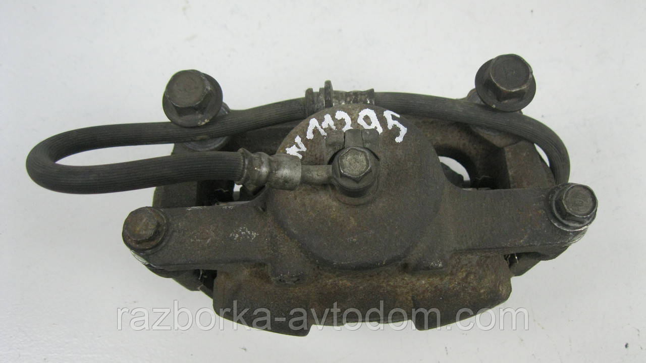 Суппорт передній правий Nissan Qashqai J10, X-Trail T31, T32, Rogue Дефект OE: 410014BA0A