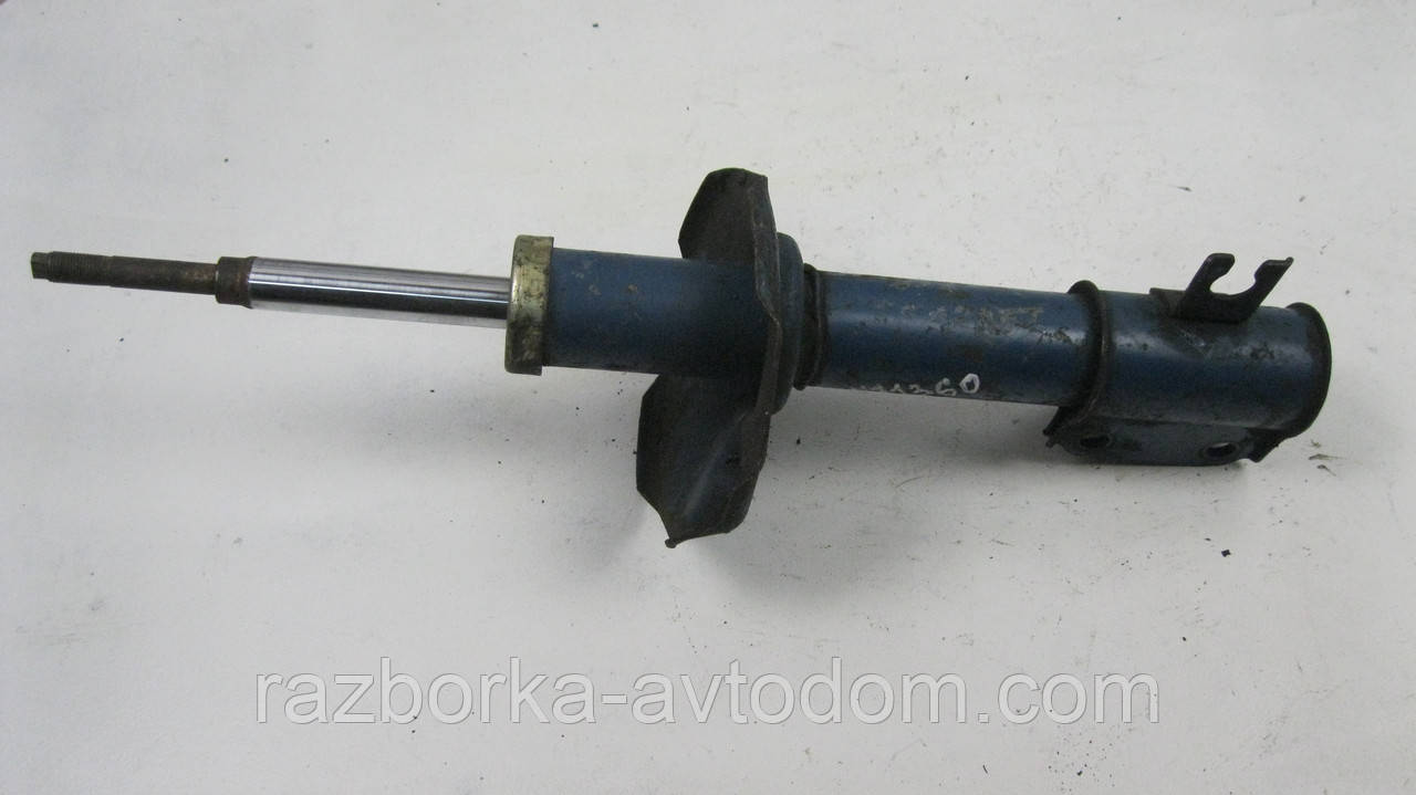 Амортизатор передній лівий Subaru Justy 2 (1995-2003), Suzuki Swift 2 (1989-2005) OE:4160280E10