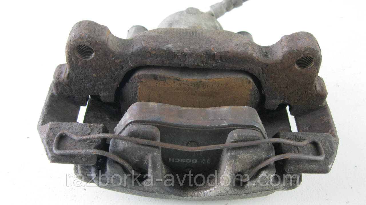 Суппорт передній правий VW Touran (03-10) (ATE), CAddy (04-15) OE:1K0615124E