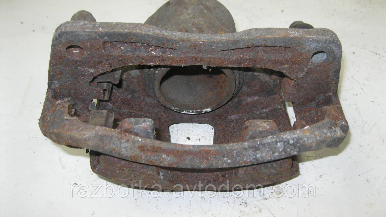 Суппорт передній лівий Hyundai Excel, Pony, Accent 2, Mitsubishi Precis OE:5818024A00