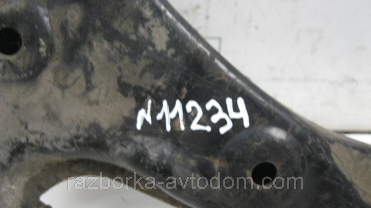 Важіль передньої підвіски нижній правий Mazda 323 BF (1985-1991), BW (1986-1995) OE: B09234310A