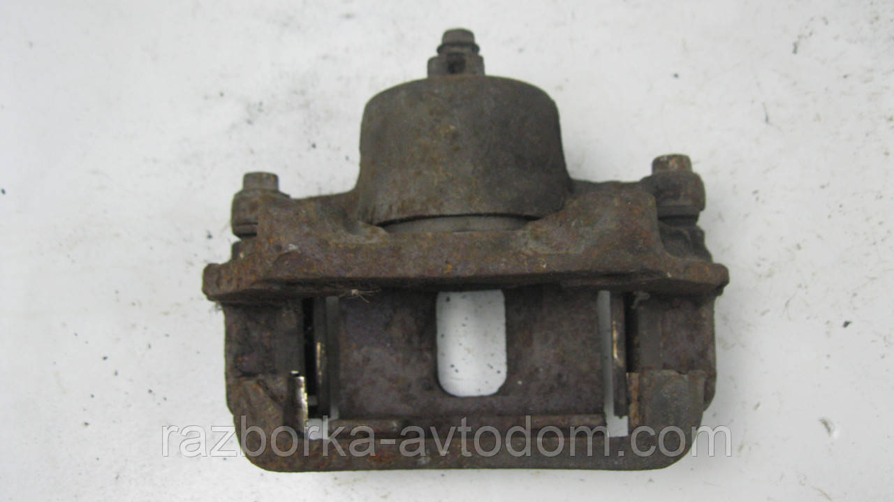 Суппорт передній лівий Nissan Bluebird U11 (1984-1988) OE:4101113E01 фото 2