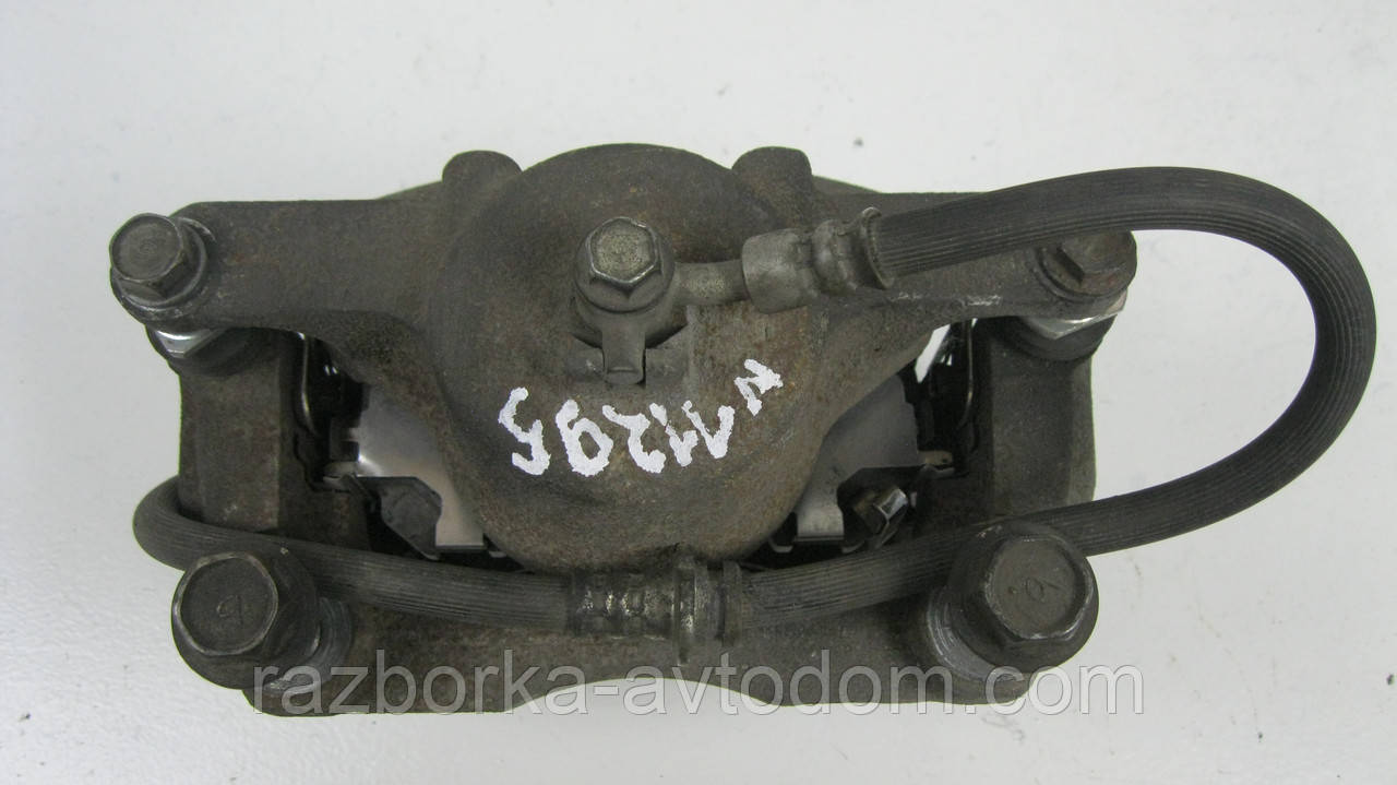 Суппорт передній правий Nissan Qashqai J10, X-Trail T31, T32, Rogue Дефект OE: 410014BA0A