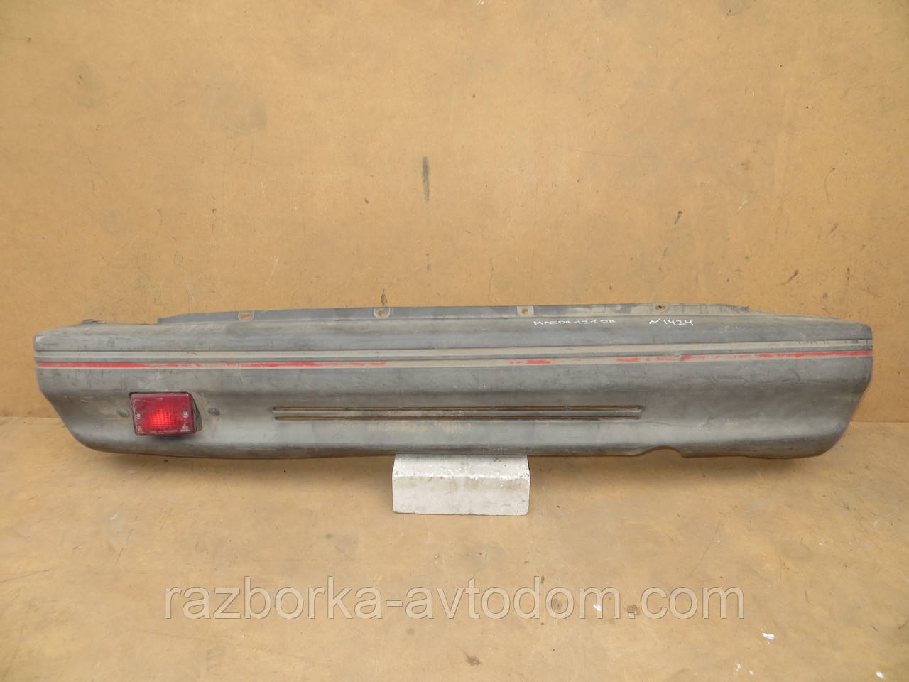 Бампер задній хетчбек Mazda 121 DA (88-91)