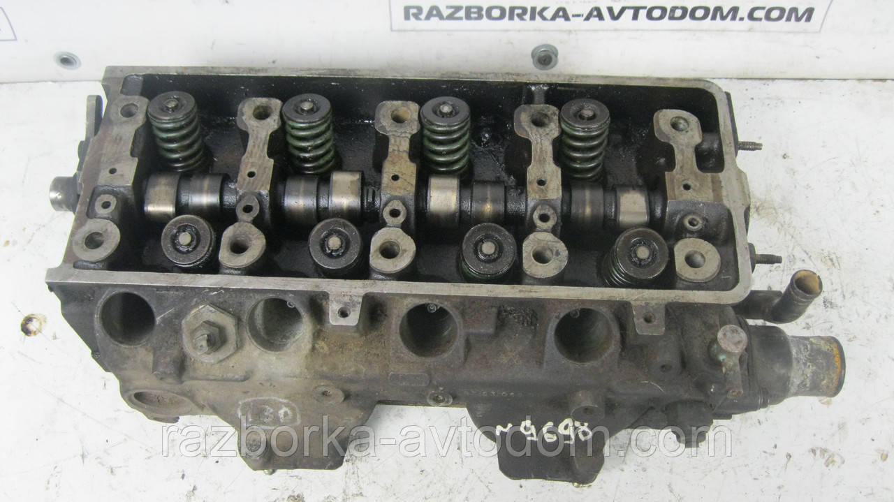 Головка блока циліндрів (ГБЦ) Peugeot 205 1.6 CTI (1986-1992) OE:9753069010