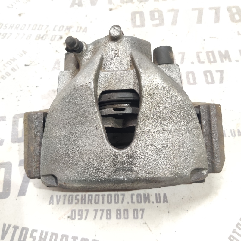 Тормозний супорт передній правий Opel Astra G (97-09) 2.0D