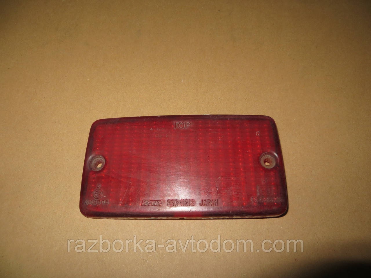 Скло фари задньої протитуманної Daihatsu Sporterak (89-92) OE:koito 236-11216